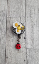 Load image into Gallery viewer, Daisy, Bee and Lady bug Badge Reel
